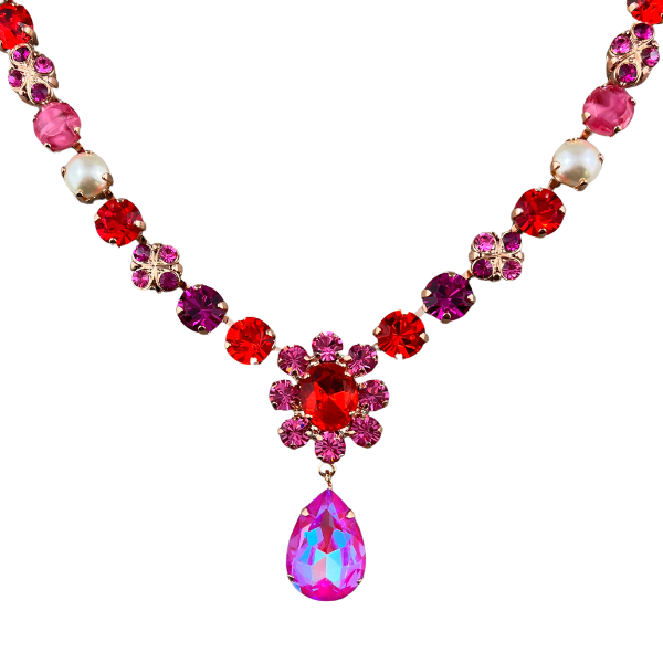 Image of pink, purple, red Swarovski crystal necklace with pink and red flower centrepiece attached with an iridized pink crystal teardrop dangle. Set in 18ct Rose gold plated metal.
