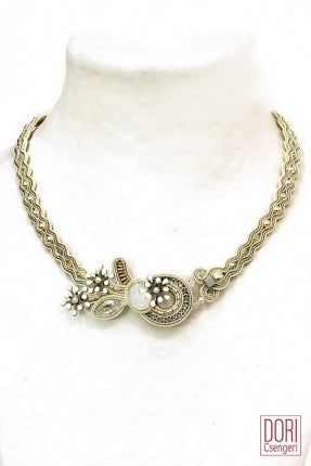 Image of chunky elegant necklace encrusted with swarovski crystals and pearls.