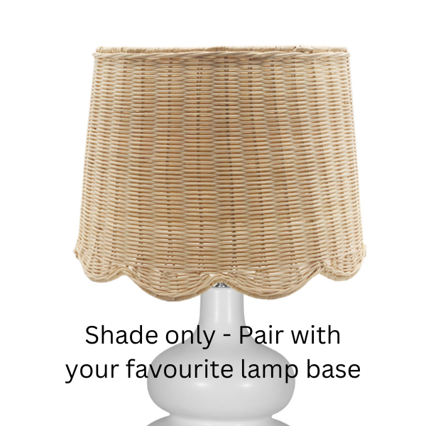 Image of lamp shade crafted from woven rattan and white scalloped edge.