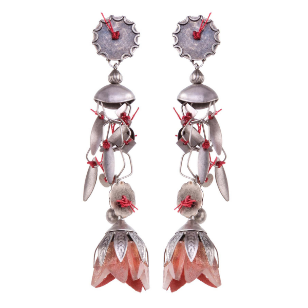 A stunning drop earring with silver castings and an apricot flower blossom dangle. Red thread highlights.