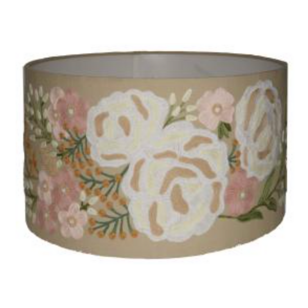 Image of drum lampshade with a taupe cotton/linen embroidered with a soft pink and white floral design, trimmed with feathery green foliage.
