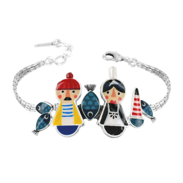 Image of bracelet with a continental sailor and wife, fish and lighthouse. Multicoloured.