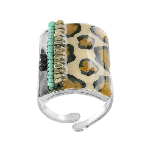 Rebelle Collection jewellery from Taratata Bijoux is ideal for those who are wild at heart. Animal print is the main element of this design and is trimmed with aqua motifs, bronze beads and set in silver metal.