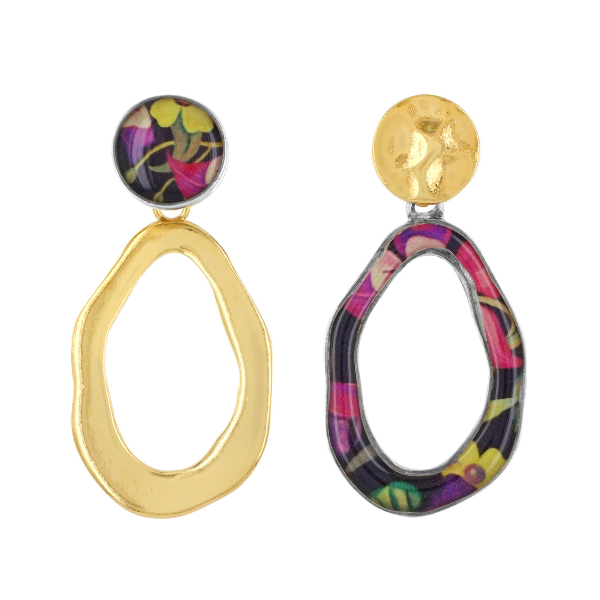 Image of squiggly creole earrings encrusted with hand painted patterns on one side and gold plated on other.