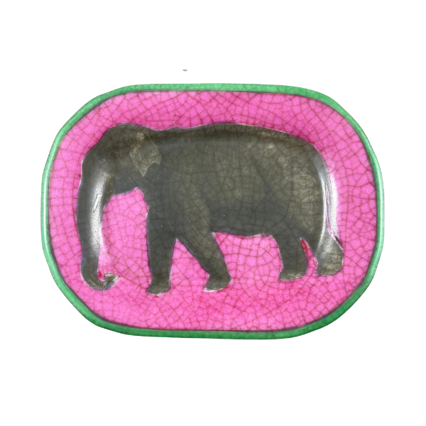 Image of porcelain dish featuring an elephant design over pink antique crackle glaze with green trim.